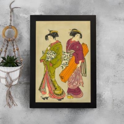 Vintage Japanese wall art with two women in traditional kimonos, featuring rich colors, fine details, and a soft beige background in a black frame. displayed on the wall