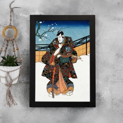 Vintage Japanese warrior in snowy landscape with rich colors, traditional robe details, and floral vintage art elements. displayed on the wall in a black frame