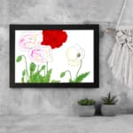 Infidu Vintage Floral Wall Art with red, white, and pink flowers in a black frame. displayed on the wall