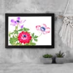 Vintage floral wall art featuring red, pink, and purple flowers with green leaves, framed in black for a classic finish. displayed on the wall