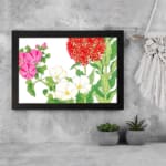 Infidu vintage floral wall art with pink, white, and red flowers, green leaves, and a black frame. displayed on the wall