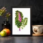 Infidu vintage wall art featuring two intricately detailed green plant leaves, one with a deep pink center, set against a clean white background. displayed on the wall art in a black frame