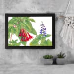 Infidu Vintage Botanical Wall Art with red and blue flowers, green leaves, and a black frame on a white background. Classic floral vintage art. displayed on the wall
