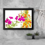 Infidu Vintage Floral Wall Art with bright pink and yellow-orange flowers, green leaves, and a black frame on a white background. displayed on the wall
