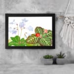 Infidu Vintage Floral Wall Art with light purple flowers, a small red flower, and dark green leaves on a white background. displayed on the wall