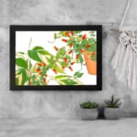 Infidu vintage wall art with green leaves, red-orange flowers, and a potted plant, framed in black on a white background for an elegant look. displayed on the wall art in a black frame