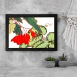 Infidu vintage wall art with bright red flowers, large green leaves, and a black frame on a white background for a classic and elegant look. displayed on the wall