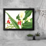 Infidu vintage wall art with white calla lilies, red flowers, and green leaves on a white background, framed in black for a classic and stylish look. displayed on the wall