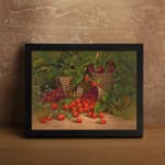 Rustic vintage wall art featuring strawberries spilling from wooden baskets with green leaves and a garden background. displayed on the wall in a black frame