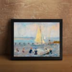 Infidu vintage wall art featuring a peaceful seaside scene with a sailboat on calm waters, people on the beach, and soft pastel colors in the sky. displayed on the wall art in a black frame