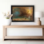 Vintage wall art of a mysterious coastal scene with glowing light, stormy sky, cliffs, and a lone figure walking along the shore. displayed on the wall in a black frame