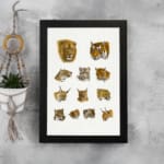 Vintage wild cat illustration featuring lions, tigers, lynxes, and more in a detailed, scientific style on a plain white background. displayed on the wall in a black frame