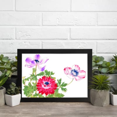 Vintage floral wall art featuring red, pink, and purple flowers with green leaves, framed in black for a classic finish. displayed on the wall