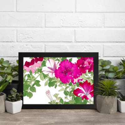 Infidu Vintage Floral Wall Art with pink and red flowers, green leaves, a white background, and a black frame for an elegant and timeless look. displayed on the wall