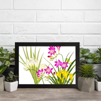 Infidu Vintage Floral Wall Art with pink, yellow & white flowers, green leaves, and a black frame on a white background. displayed on the wall