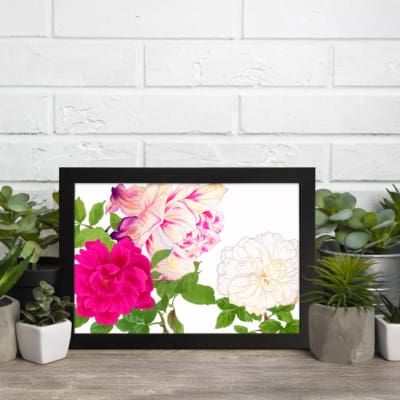 Infidu Vintage Floral Wall Art with pink, cream, and white flowers, green leaves, and a black frame on a white background. displayed on the wall