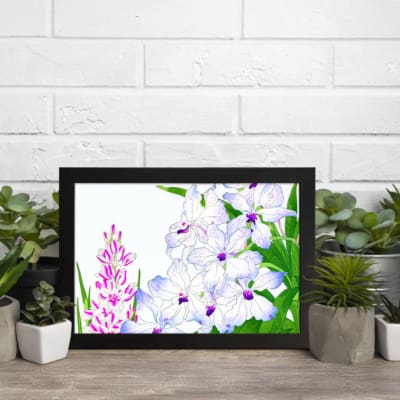 Infidu Vintage Floral Wall Art with white, purple, and pink flowers, green leaves, and a black frame, adding a classic touch to any décor. displayed on the wall