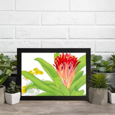 Infidu Vintage Botanical Wall Art with red, orange, and yellow flowers, green leaves, and a black frame on a white background. displayed on the wall
