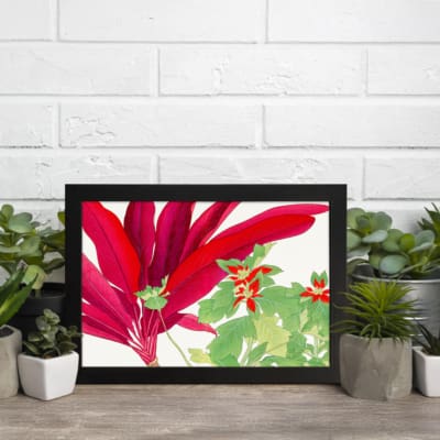 Infidu Vintage Floral Wall Art with large red leaves, green leaves with red accents, and a black frame on a white background. displayed on the wall.