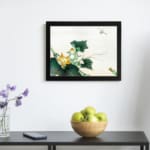 Infidu vintage wall art featuring a detailed botanical design with green leaves, bright yellow flowers, and a delicate dragonfly hovering above, set against a light background. displayed on the wall art in a black frame