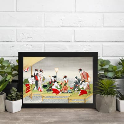 Vintage Japanese wall art with geishas in a tea ceremony, featuring red, white, black, and green tones in a serene outdoor setting with a black frame. displayed on the wall
