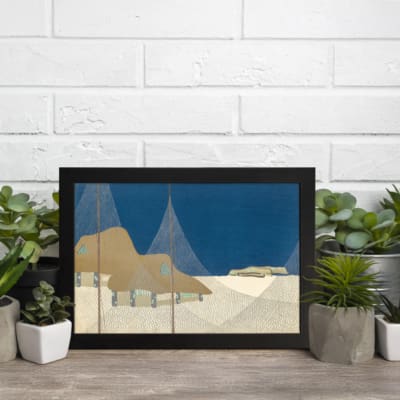 Vintage abstract wall art with a minimalist landscape design, featuring deep blue, beige, and brown tones in geometric shapes with a black frame. displayed on the wall