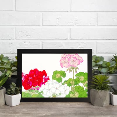 Infidu Vintage Floral Wall Art with red, white, and pink flowers, green leaves, and a black frame on a white background. displayed on the wall