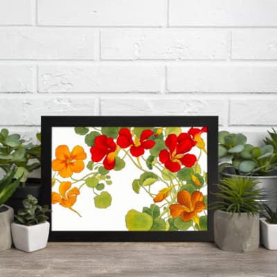 Infidu vintage floral wall art with red and orange flowers, green leaves, and a black frame on a white background. displayed on the wall