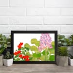 Infidu vintage wall art with soft pink and bright red flowers surrounded by lush green leaves on a white background, creating an elegant look. displayed on the wall art in a black frame
