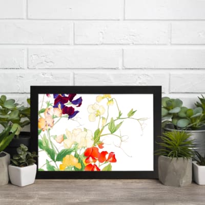Infidu vintage wall art with red, yellow, purple, and white flowers, green leaves, and a black frame on a white background for an elegant look. displayed on the wall