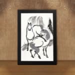 Infidu vintage wall art featuring two horses in black and white ink with bold brushstrokes, creating a timeless and dynamic design. displayed on the wall art in a black frame