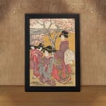 Japanese women in traditional kimonos standing under cherry blossom trees in a serene vintage-style outdoor setting. displayed on the wall in a black frame