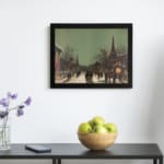 Infidu vintage wall art featuring a winter city scene with snowy streets, people walking, horse-drawn carriages, and warm golden lights from historic buildings, creating a cozy, old-fashioned atmosphere. displayed on the wall art in a black frame
