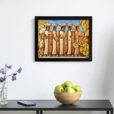 Infidu vintage wall art featuring a group of women in traditional clothing carrying baskets, set against a tropical backdrop with banana trees and a bright blue sky. displayed on the wall art in a black frame