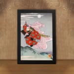 Infidu vintage wall art featuring a gracefully dressed figure in traditional Japanese attire against a serene moonlit sky, with rich red and pink floral designs contrasting a soft gray and blue background. displayed on the wall art in a black frame