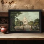 Infidu vintage wall art featuring the Taj Mahal with earthy tones of green, beige, and brown, framed by lush trees and a long pathway leading to the monument. displayed on the wall art in a black frame
