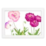 Vintage floral wall art featuring pink and purple flowers with green leaves, set against a white background with a white frame. hung on the wall