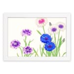 Infidu Vintage Floral Wall Art with blue, purple, and white flowers, green stems, and a white frame on a light background. hung on the wall