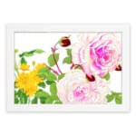 Vintage floral wall art with pink and white roses, red buds, and green leaves in a white frame on a white background. hung on the wall