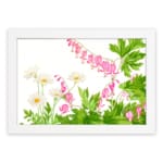 Vintage floral wall art with delicate pink and white flowers, green leaves, and a white frame on a white background. hung on the wall