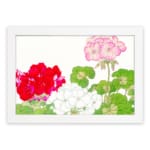 Infidu Vintage Floral Wall Art with red, white, and pink flowers, green leaves, and a white frame on a white background. hung on the wall