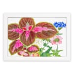 Vintage wall art featuring brown leaves with pink patterns and delicate blue, pink, and white flowers on a white background, framed in white. hung on the wall