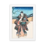 Vintage wall art of a Japanese samurai in a floral kimono standing in a peaceful winter scene with a snowy backdrop and a tree branch. hung on the wall