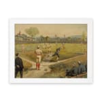 Vintage wall art of a classic baseball game with players in red and blue uniforms on a grassy field, trees and flags in the background. hung on the wall