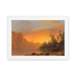 Vintage wall art of a tranquil sunset lake with warm tones, towering cliffs, and lush trees, creating a serene and timeless landscape. hung on the wall