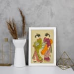 Vintage Japanese wall art with two women in traditional kimonos, featuring rich colors, fine details, and a soft beige background in a white frame. displayed on the wall