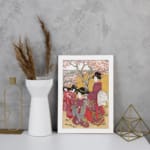 Vintage Japanese wall art with elegantly dressed women in kimonos, intricate patterns, and cherry blossom trees in a serene setting displayed on the wall in a white frame