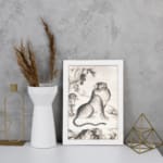 Vintage Asian tiger painting in black and white, featuring bold stripes, expressive eyes, and a natural background with trees and mountains. displayed on the wall