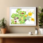 Vintage floral wall art with yellow flowers, green leaves, and a white frame on a white background. displayed on the wall