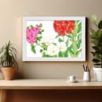 Infidu vintage floral wall art with pink, white, and red flowers, green leaves, and a white frame. displayed on the wall